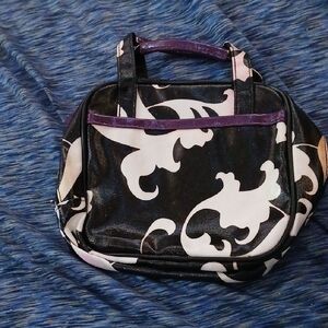 Elegant Black and White Mini Bag with Purple Accents
